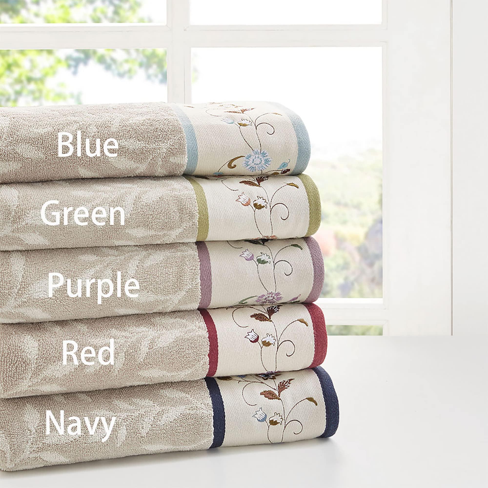 Close-up of jacquard leaf pattern on Madison Park Serene towels for a luxurious touch