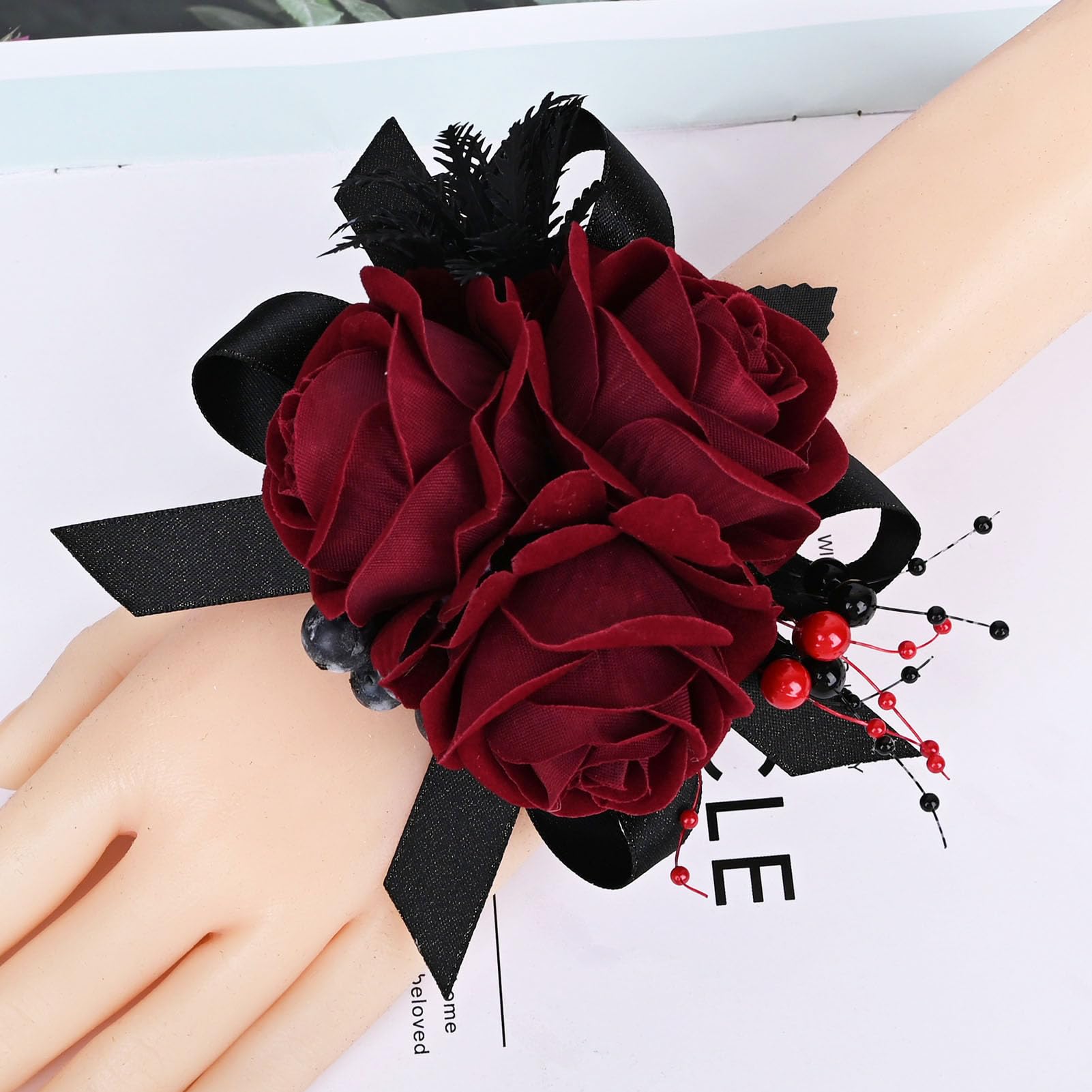 MAFELOE corsage and boutonniere on formal attire display