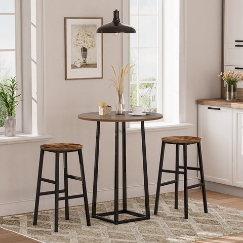 Rustic brown finish on MAHANCRIS stools adds warm industrial style to dining rooms.