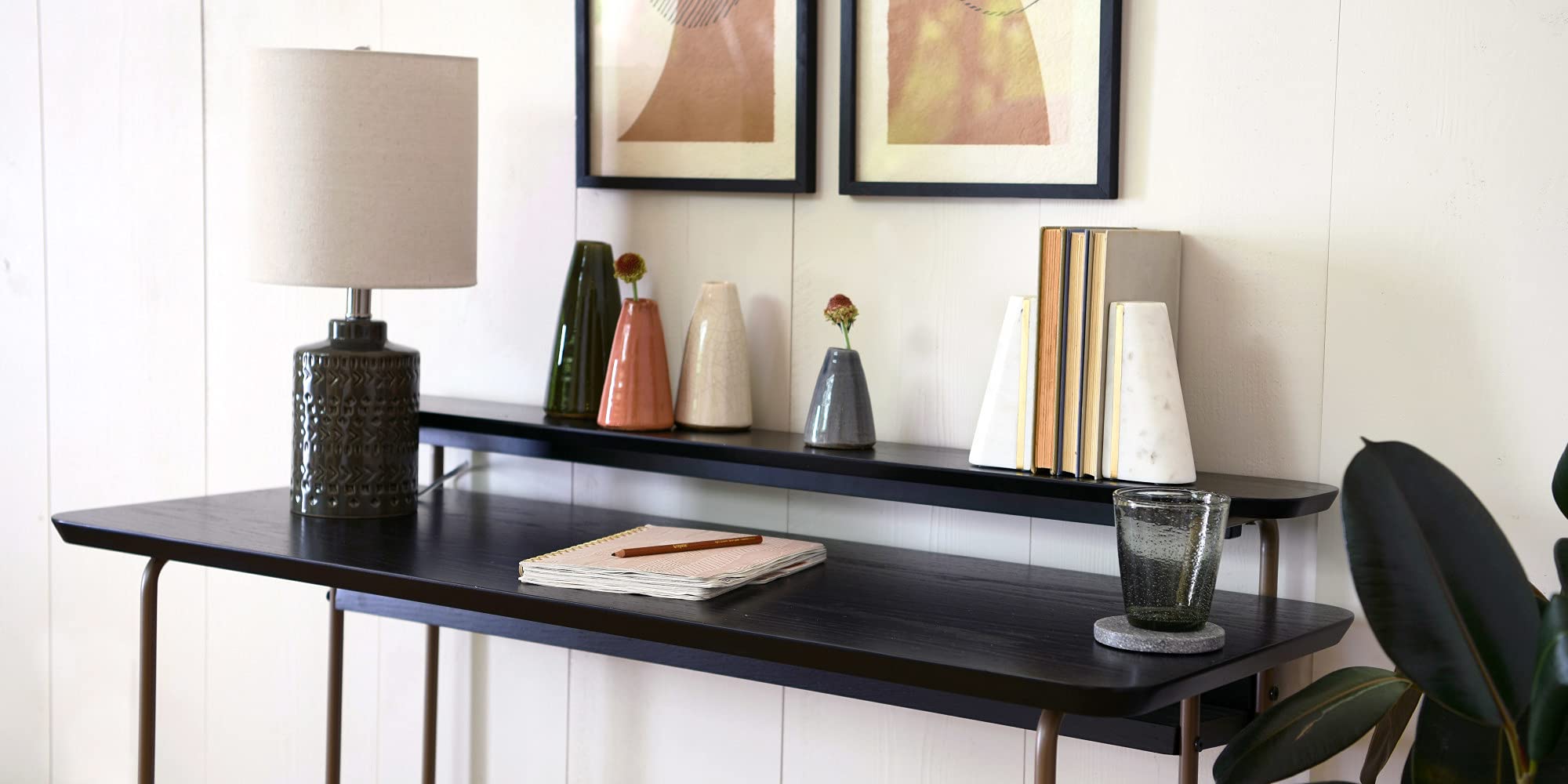 Main + Mesa marble geometric bookends with triangle shapes and wood inlay add modern boho flair to shelves.