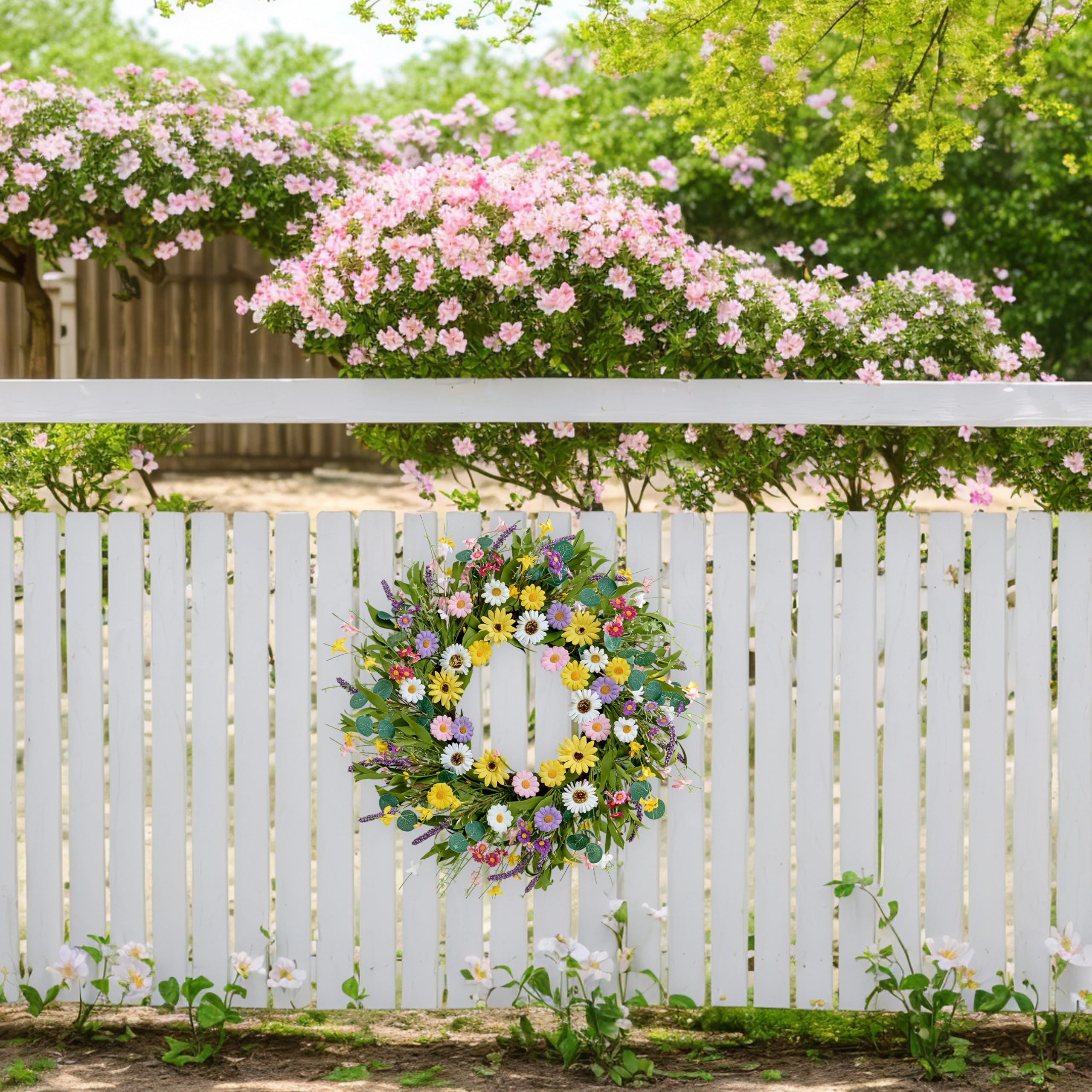 MAINGKAUNG wall decor with daisies and eucalyptus brightens living spaces.