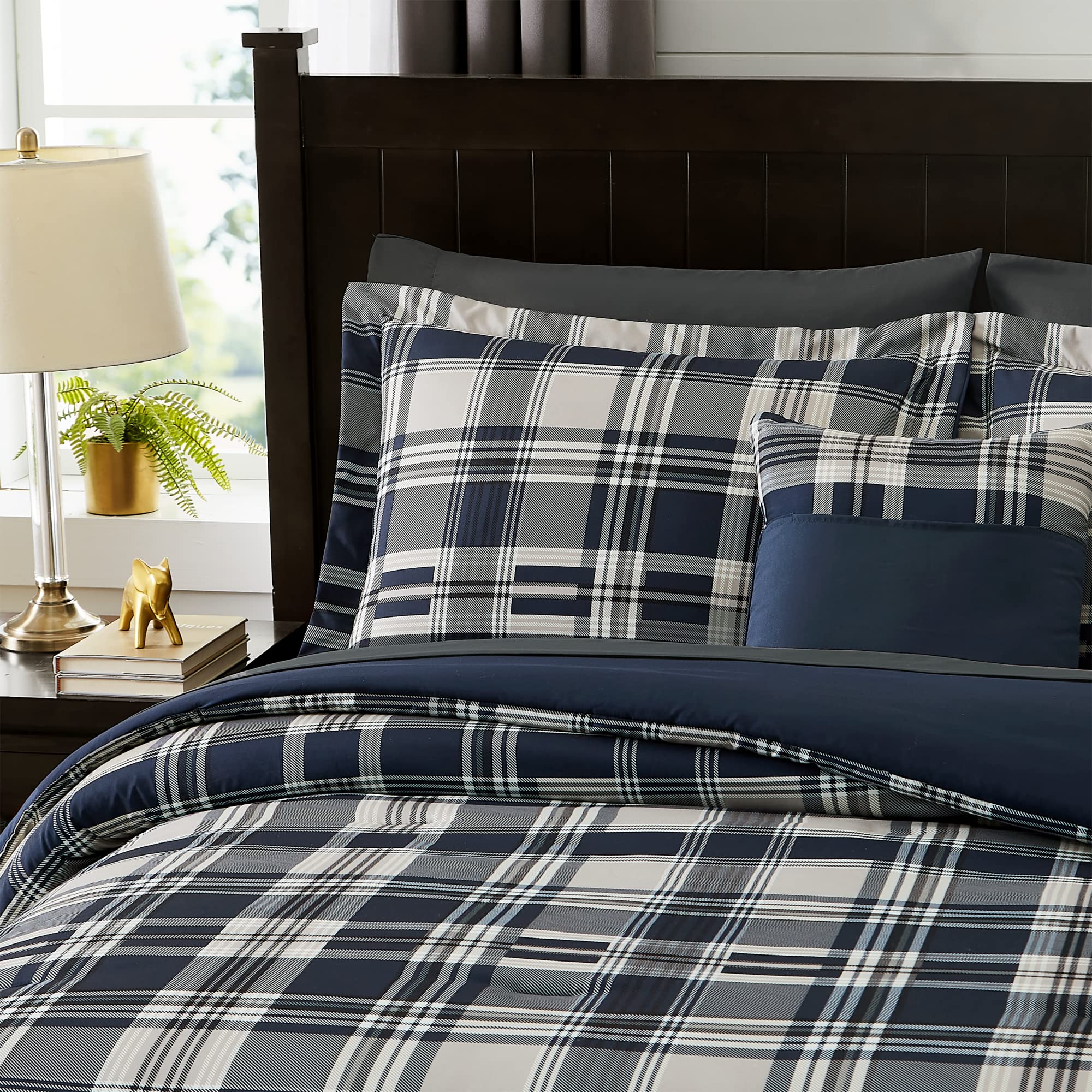 Coordinated MaiRêve bedding setup showcases navy plaid for a refreshed bedroom