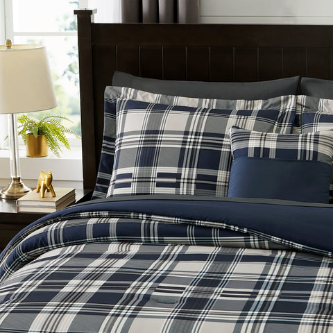 Coordinated MaiRêve bedding setup showcases navy plaid for a refreshed bedroom