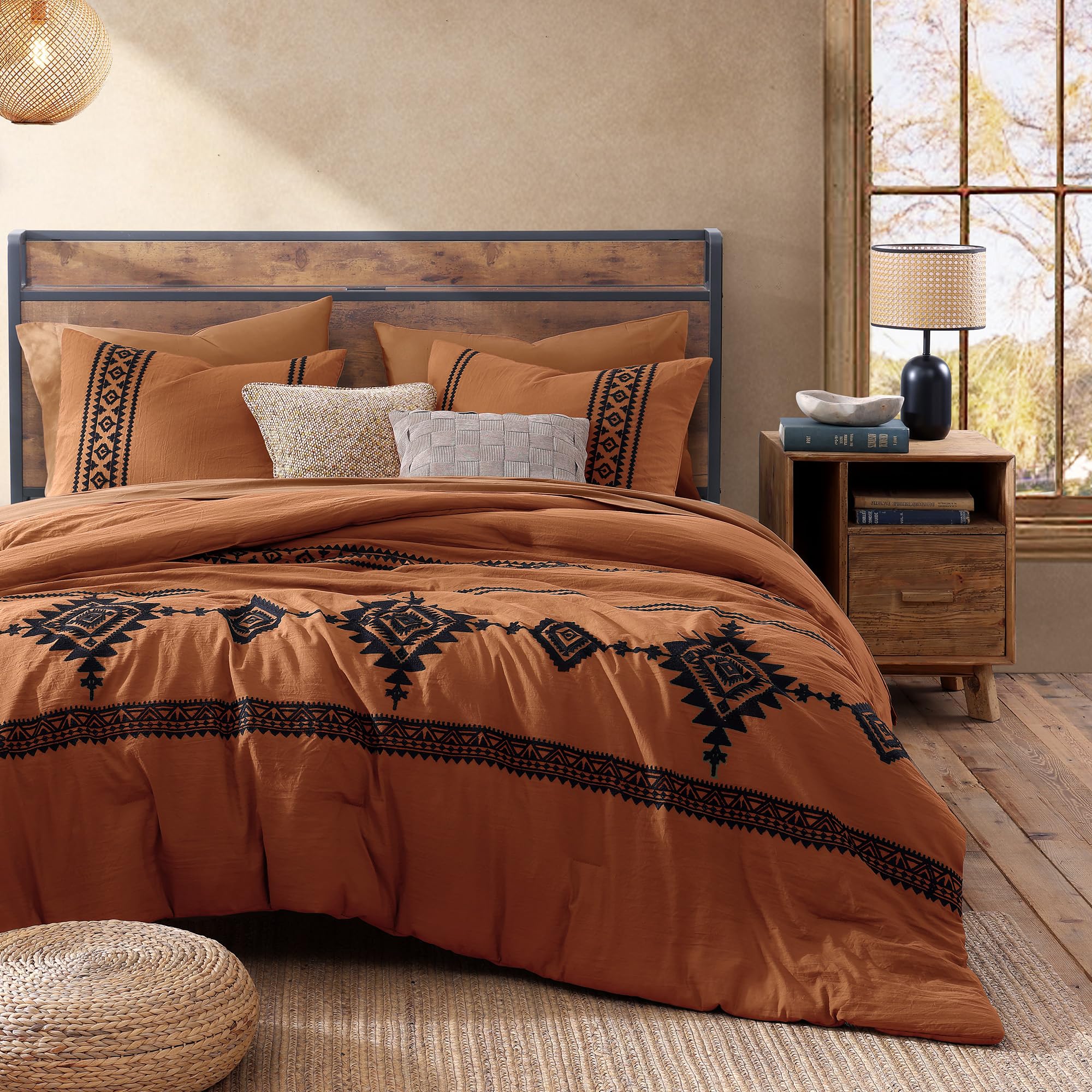 MaiRêve seven-piece king set neatly arranged on a bed.