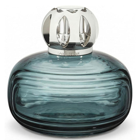 MAISON BERGER Enigma blue bottle showcases odor-neutralizing potential for living rooms.