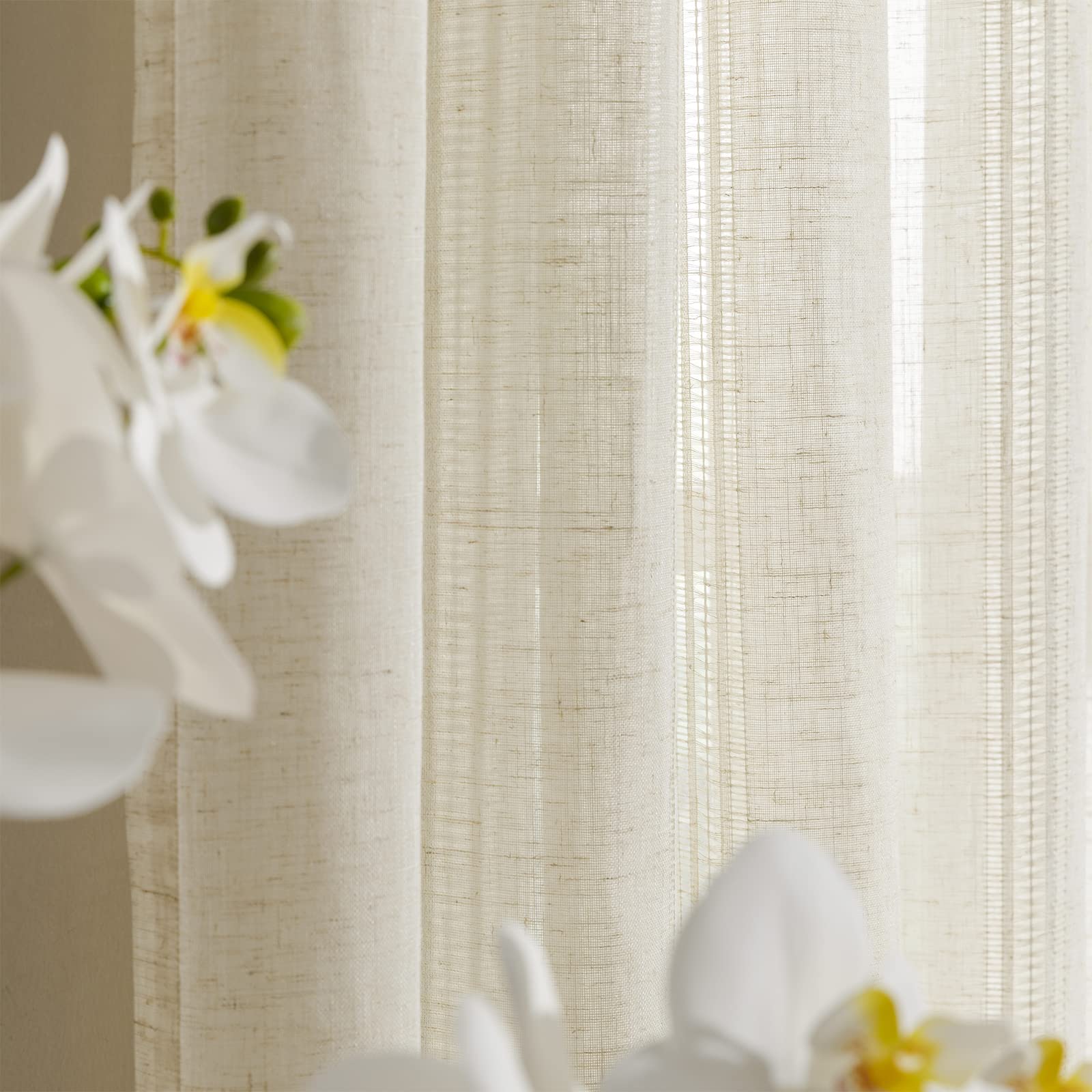 Maison Colette semi-sheer window treatment filters glare while preserving daylight.