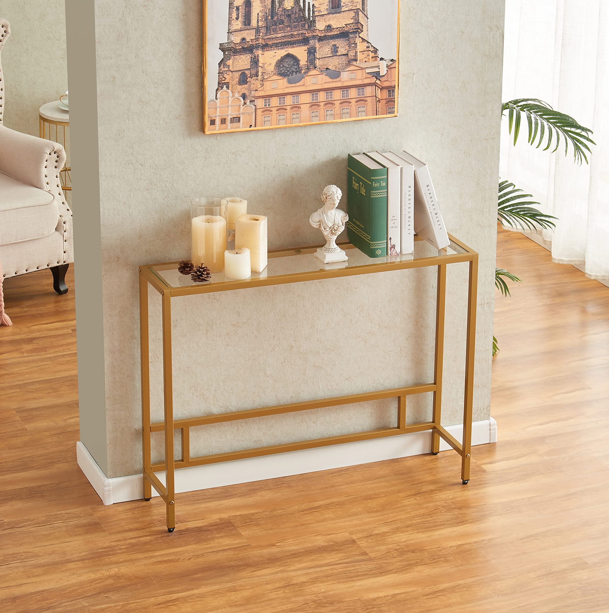 MAJARO tempered glass surface and gold frame deliver a durable, easy-to-clean centerpiece for any room.