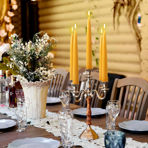 MAKALONE 8in candles on dining table create warm ambience.