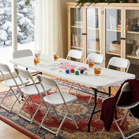 MAKE CHANGES 6ft folding table demonstrates up to 600 lb capacity.