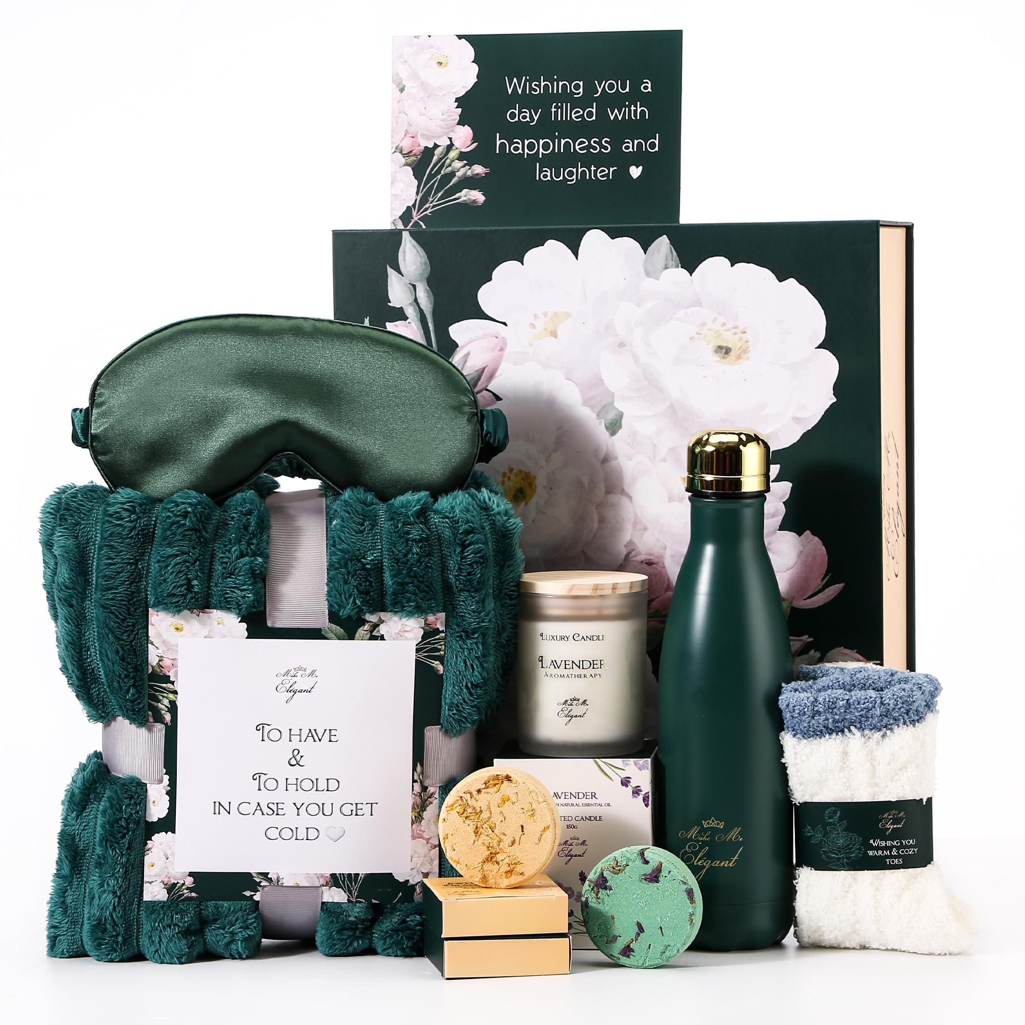 Make Me Elegant emerald green box opens to reveal a luxurious spa gift set for celebrations.