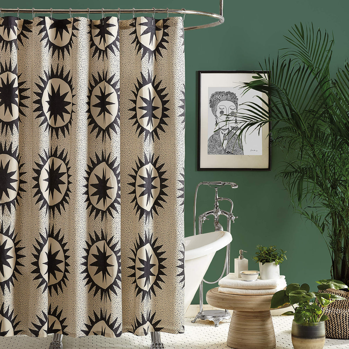 Makers Collective Jungalow Soleil curtain with geometric sun pattern for chic bathrooms.