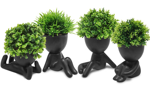 MAKHOT mini succulent in a human-shaped pot adds playful desk decor