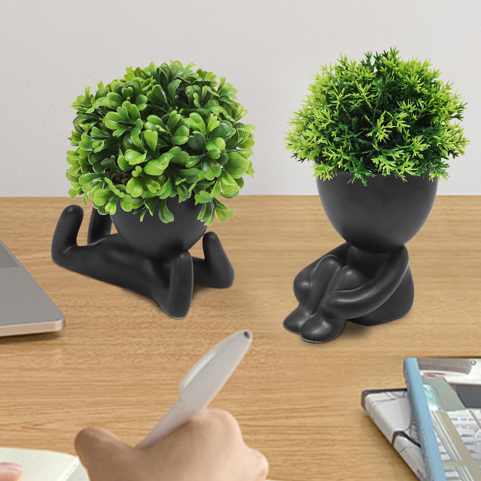 MAKHOT compact fake plant with a human-inspired pot brightens shelves