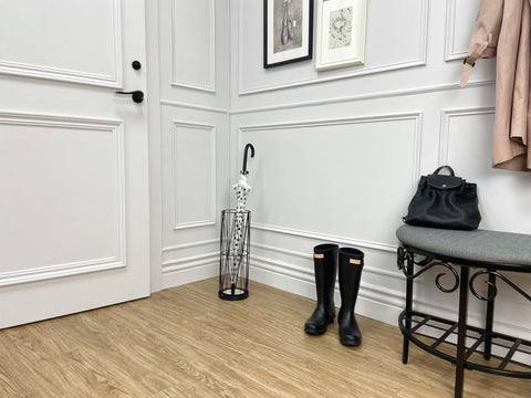 Mango Steam Pluvian Modern Decor Umbrella Holder complements mudroom aesthetics.