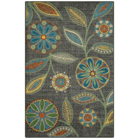 Maples Rugs Reggie floral kitchen rug in dark grey with vibrant botanical pattern for entryways.