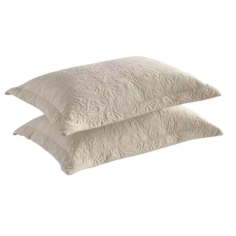 MarCielo beige pillow shams shown in a coordinated bed setup