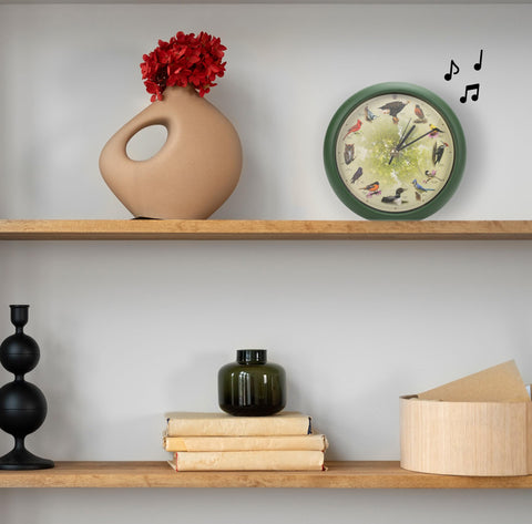 Mark Feldstein Singing Bird Clock light sensor deactivates chimes at night for quiet rooms.