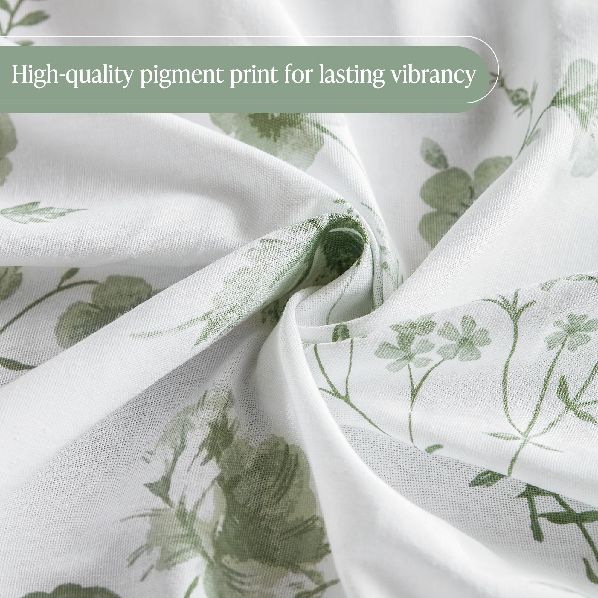 Sage-green accents on Martha Stewart Garden curtain blend with white for refreshed bathroom aesthetics.