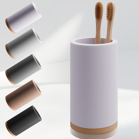Matani bamboo toothbrush holder with diatomite dries brushes quickly on the bathroom counter.