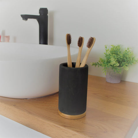 Matani light-grey toothbrush holder design, blends with modern counters.