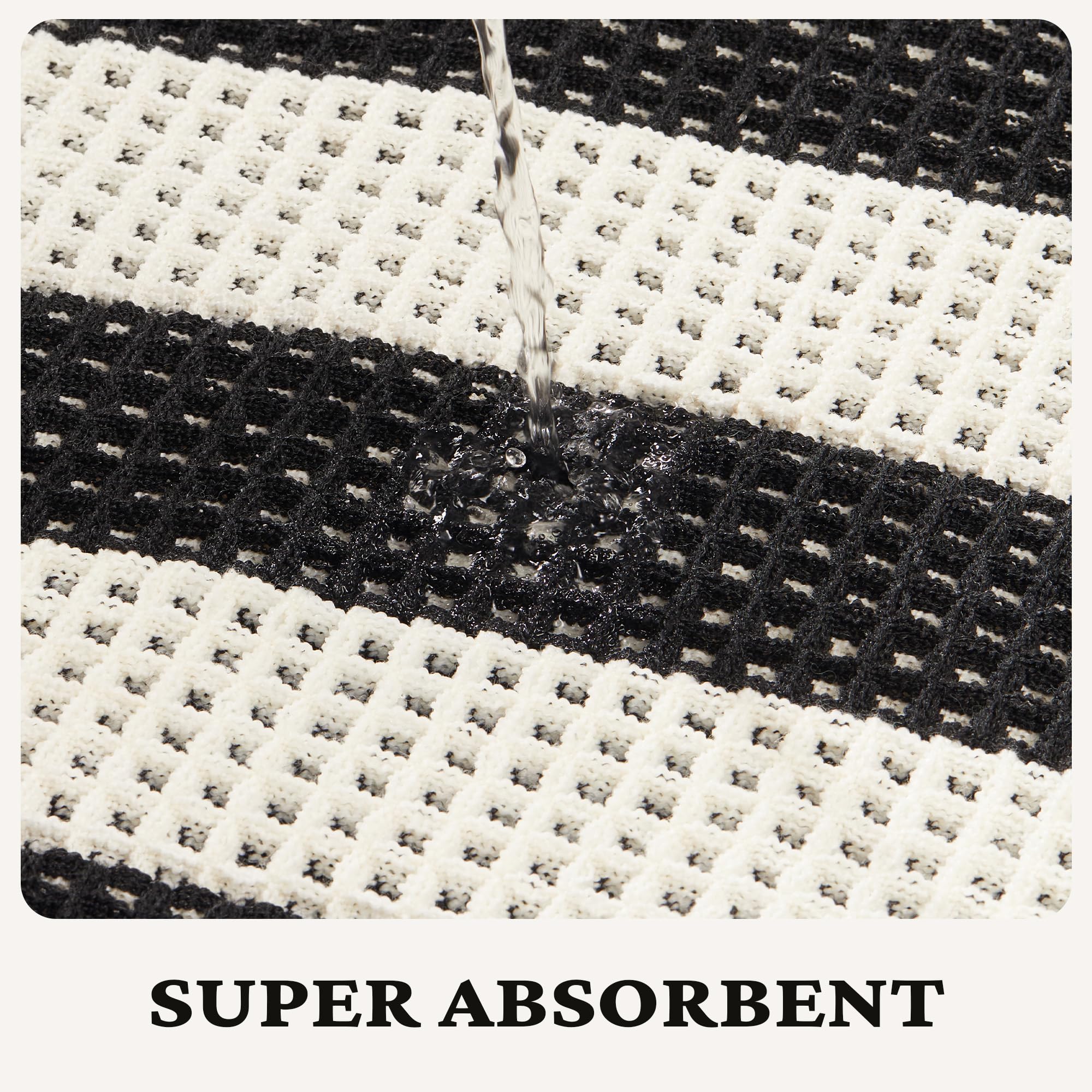 MatEssenz tassels edge bath mat adds boho charm and fringe detail.