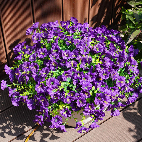 Maxkes UV-resistant artificial flowers stay bright on patios.
