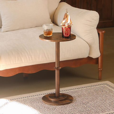 MaxSmeo Drink Table fits neatly in tight spaces beside a sofa.
