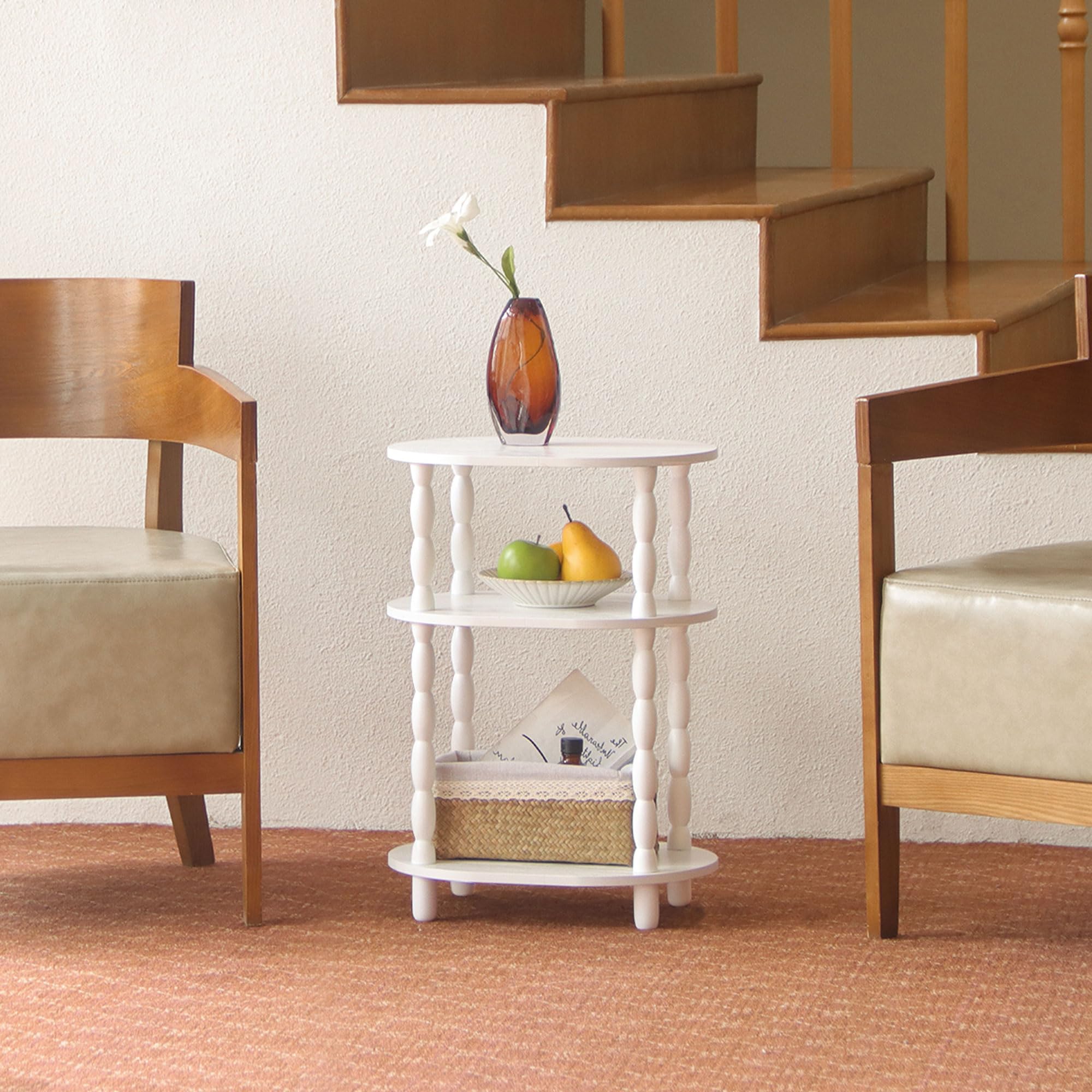 MaxSmeo oval end table with 3-tier shelves offering organized storage beside seating.