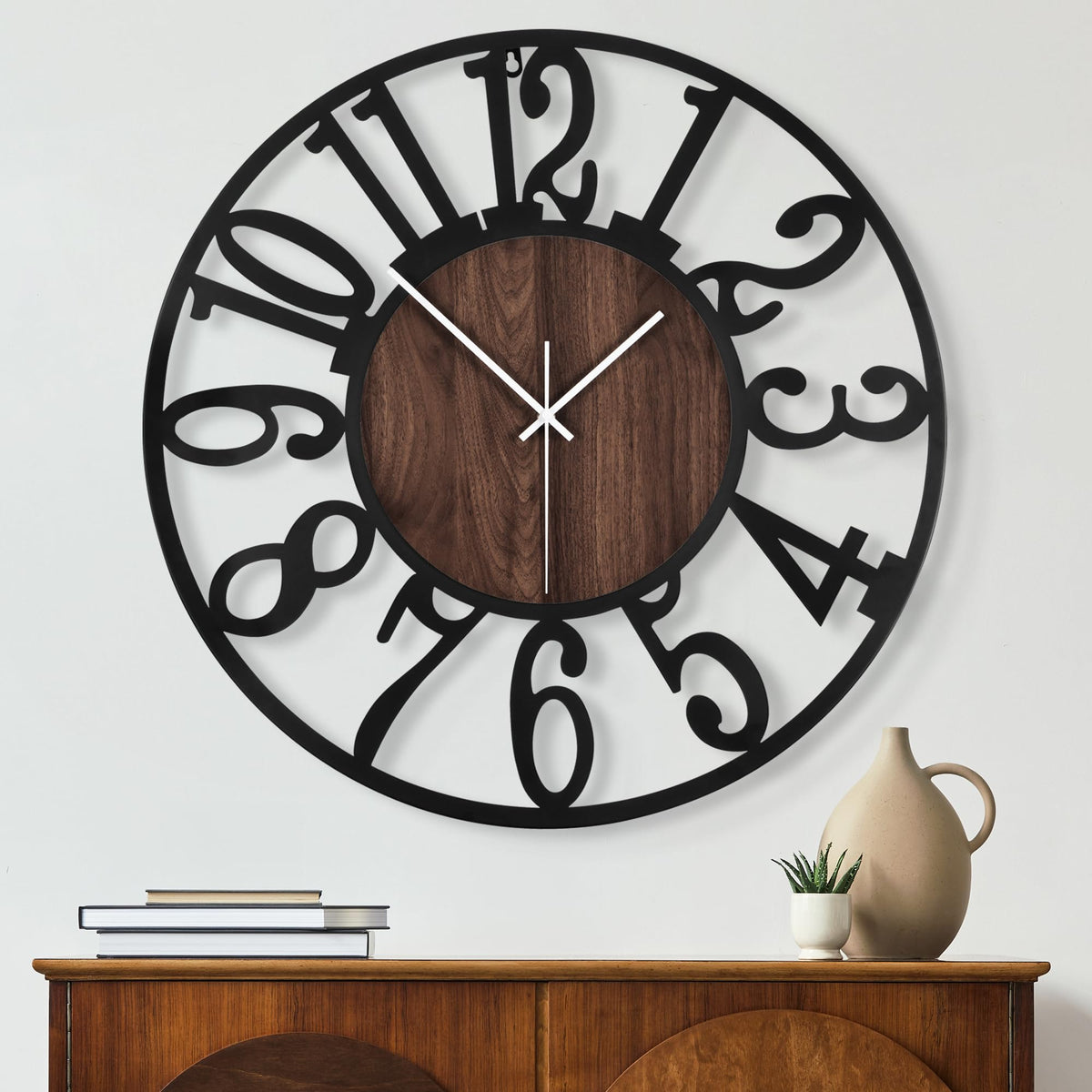 Maxstar round wall clock front view enhances living room decor and readability.