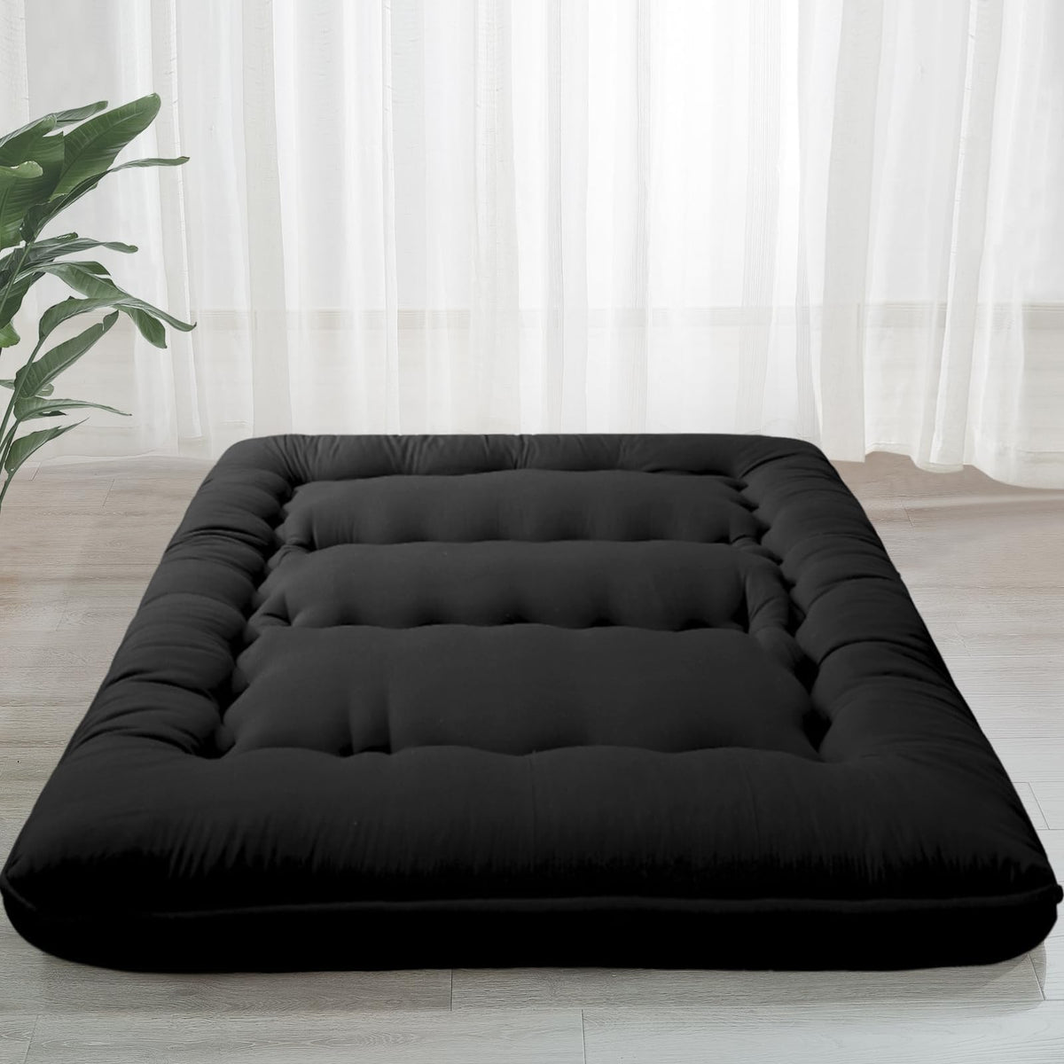 MAXYOYO 6-inch floor mattress folded for storage demonstrates compact portability