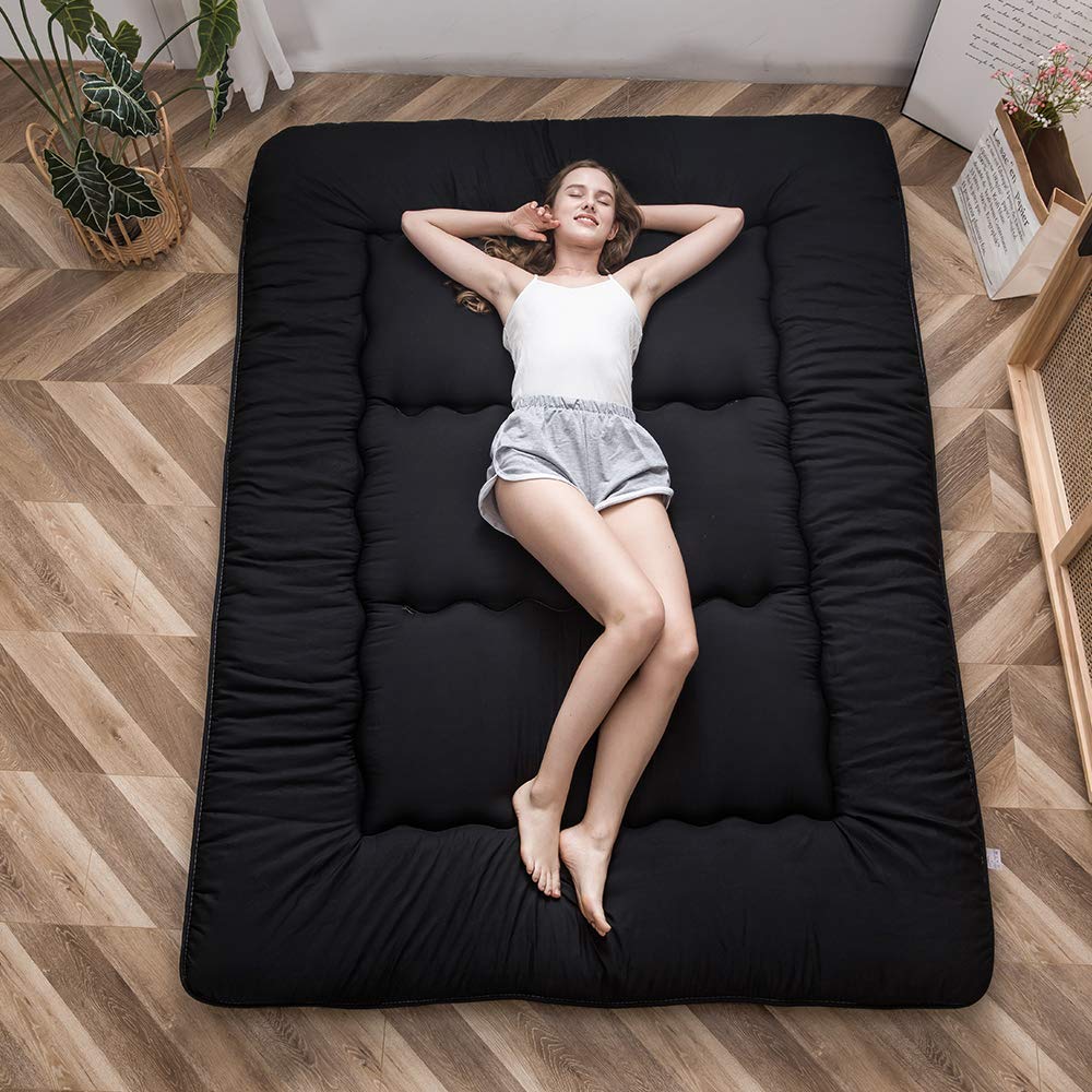 MAXYOYO Japanese floor mattress 4-inch thick for versatile lounging and sleeping.