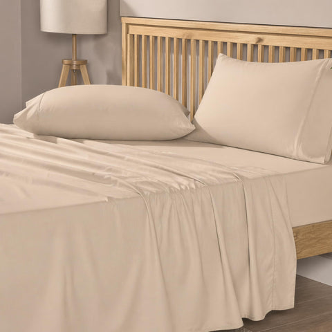 Mayil Manor cream beige 4-piece set on a bed for hotel-inspired comfort