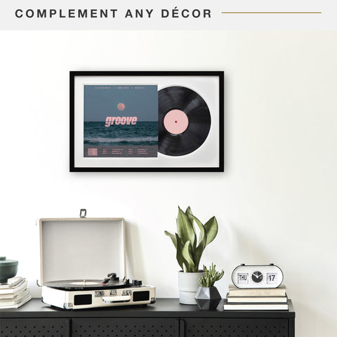 Durable MDF wood construction supports a secure vinyl and jacket presentation