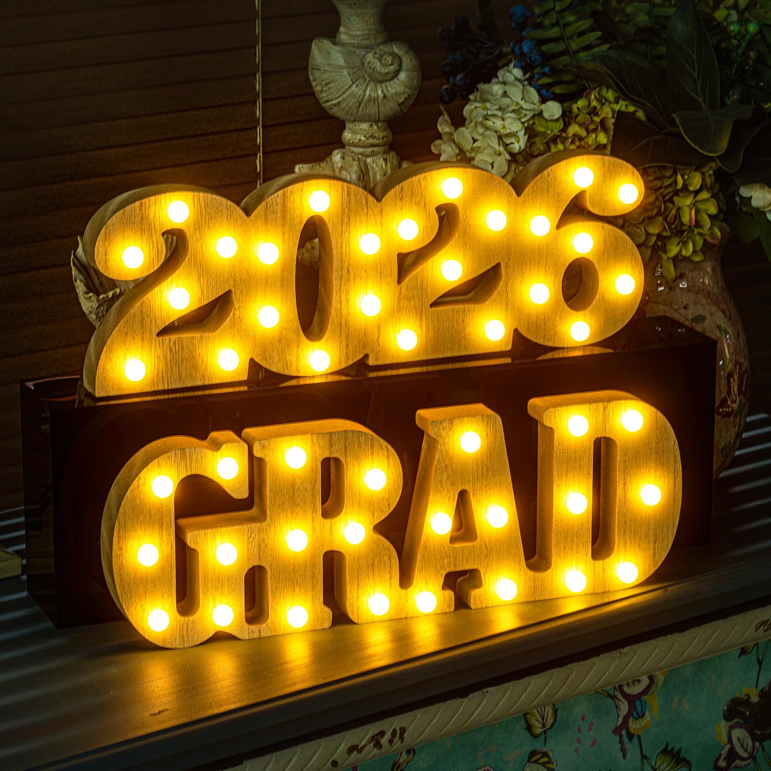 Meadin Grad 2026 LED letters light up a wall display to elevate room decor