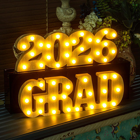 Meadin Grad 2026 LED letters light up a wall display to elevate room decor