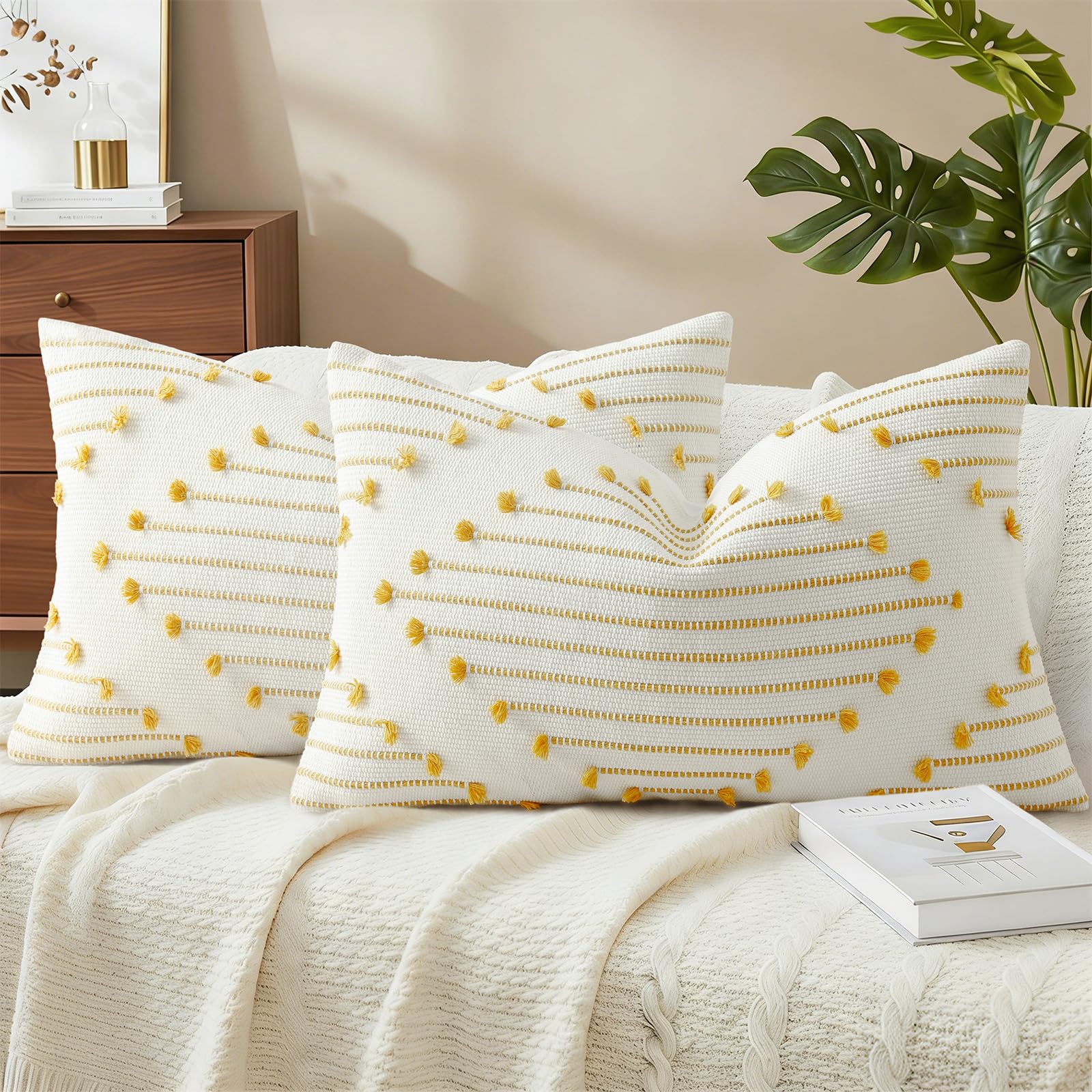 Mecatny boho tassels on yellow pillow cover for patio decor and cozy outdoor seating.