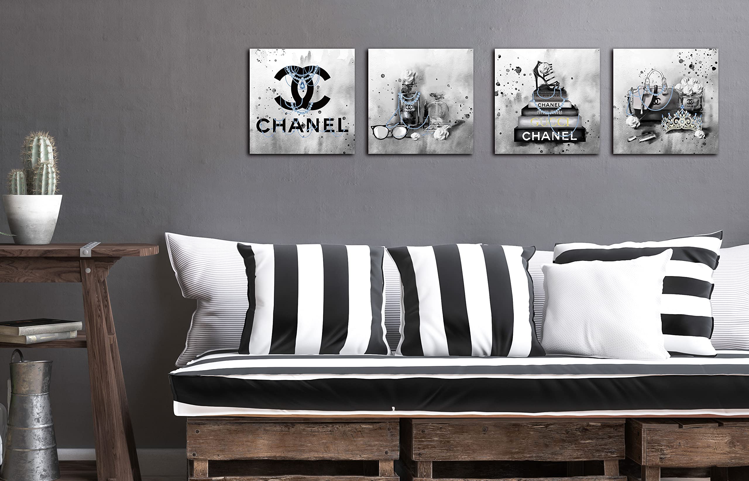 Meetdeceny fashion book stack grey painting creates a refined focal point.