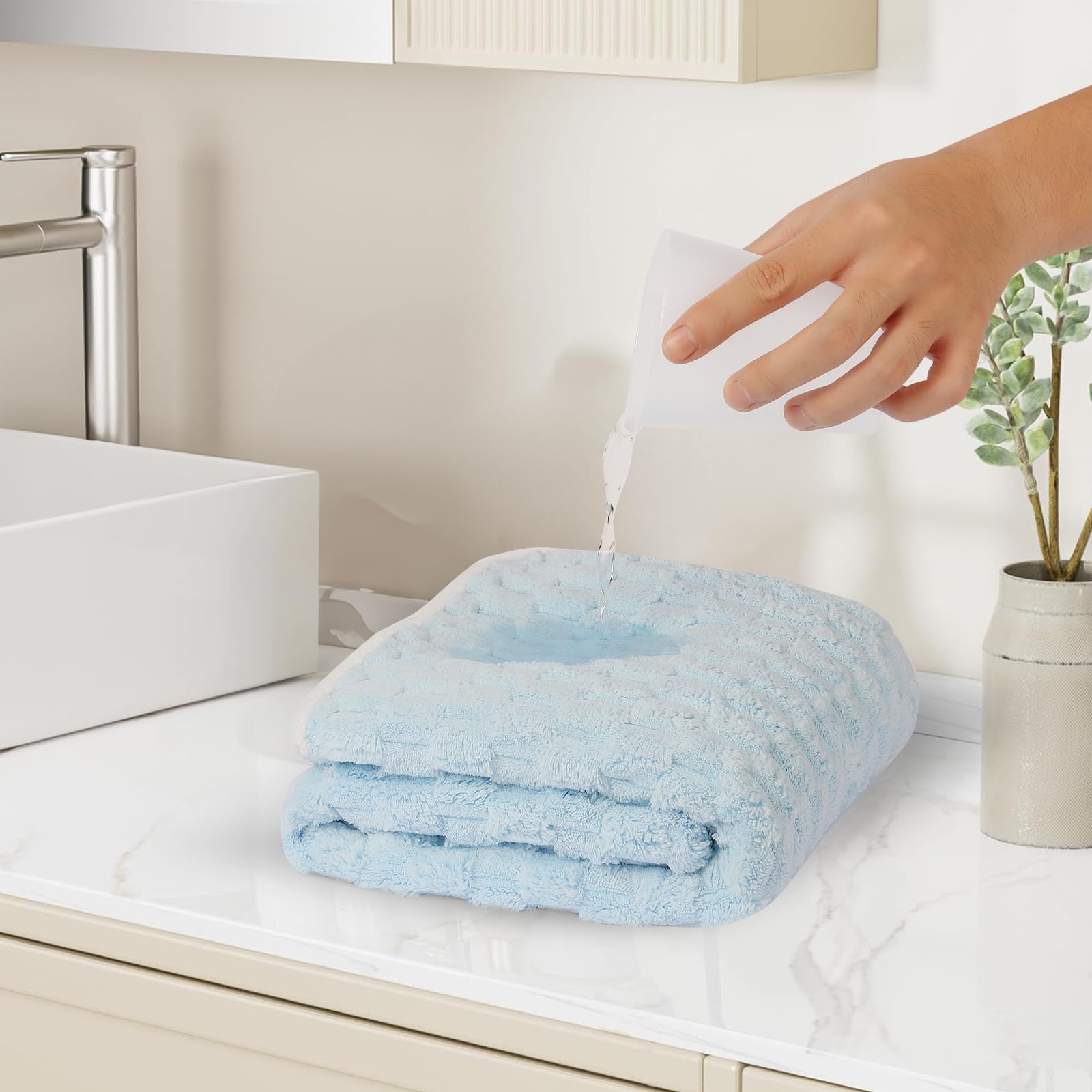 Meishiqi towels with extended drape to stay in place after a bath.