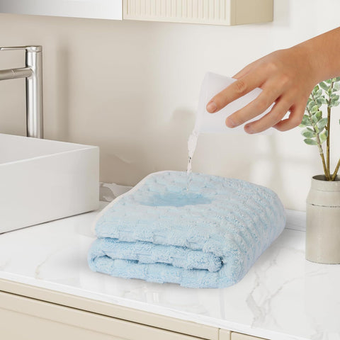 Meishiqi towels with extended drape to stay in place after a bath.