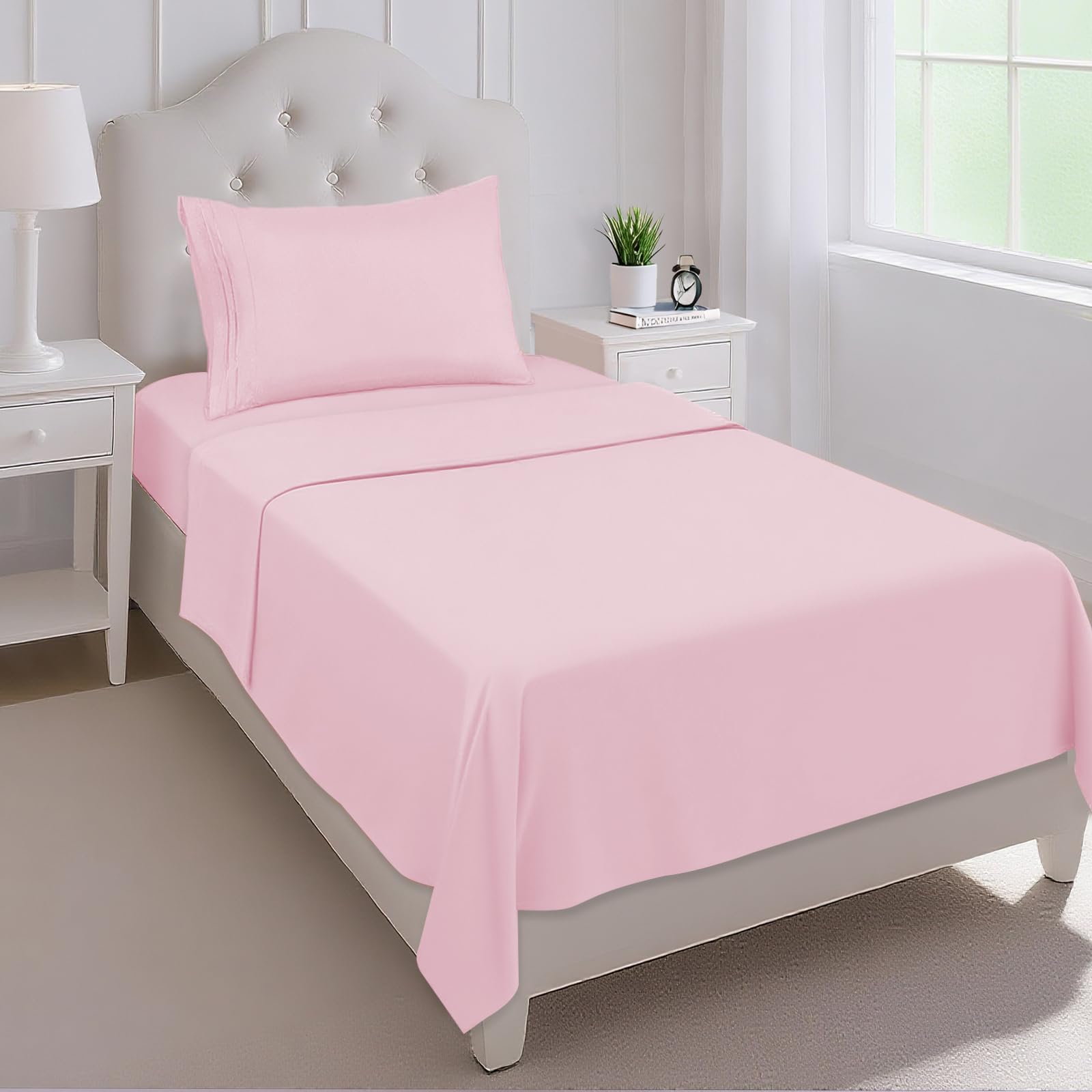 Mejoroom twin sheet set in blush pink on bed for cozy comfort.