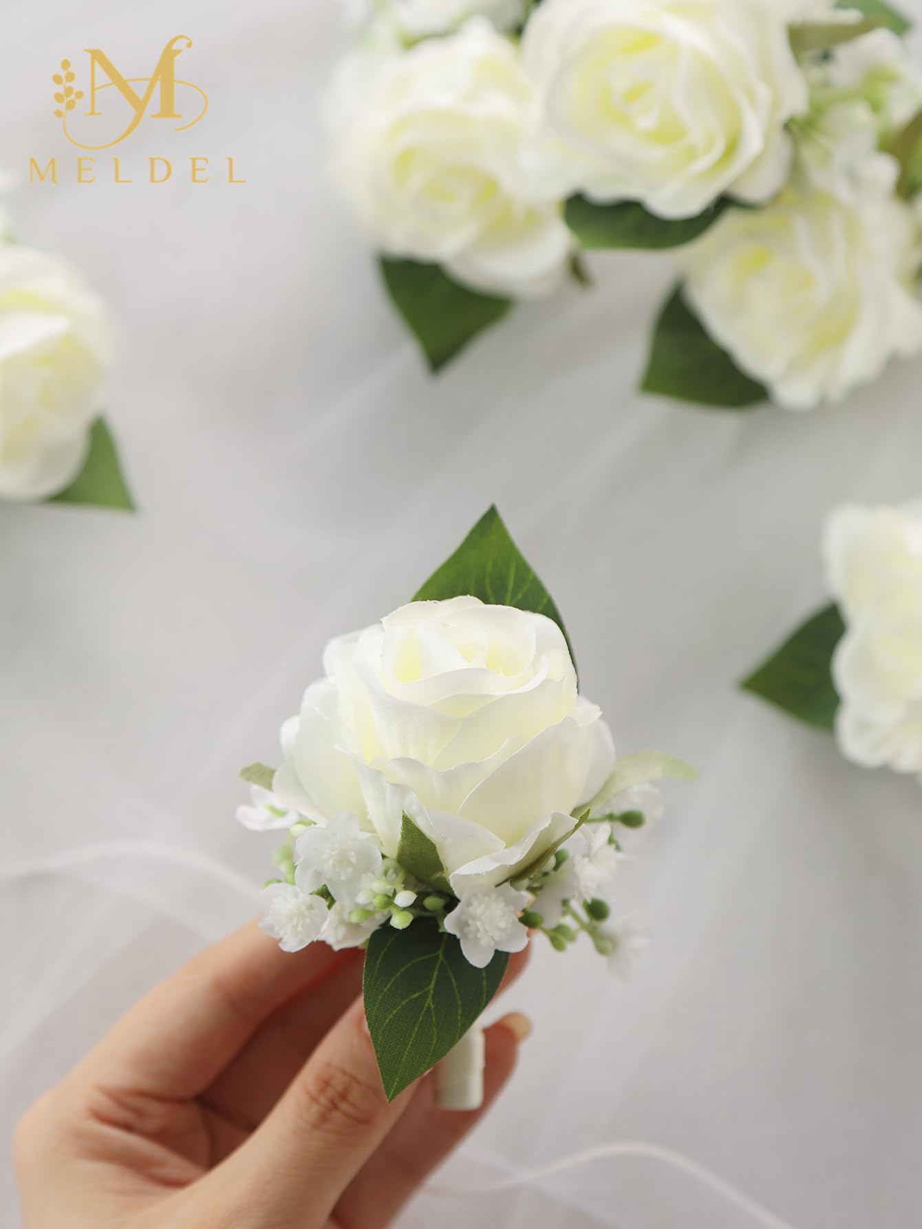 Meldel boutonniere back pin design ensures secure wear during celebrations.