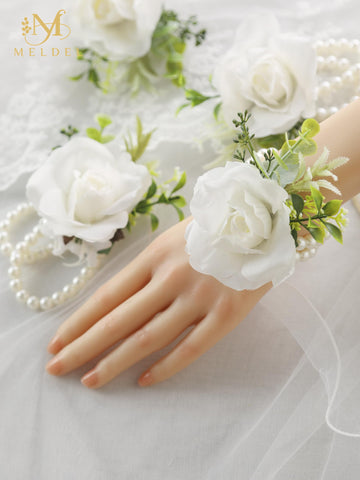 Meldel ivory rose closeup with tiny flowers and greenery highlighting delicate texture