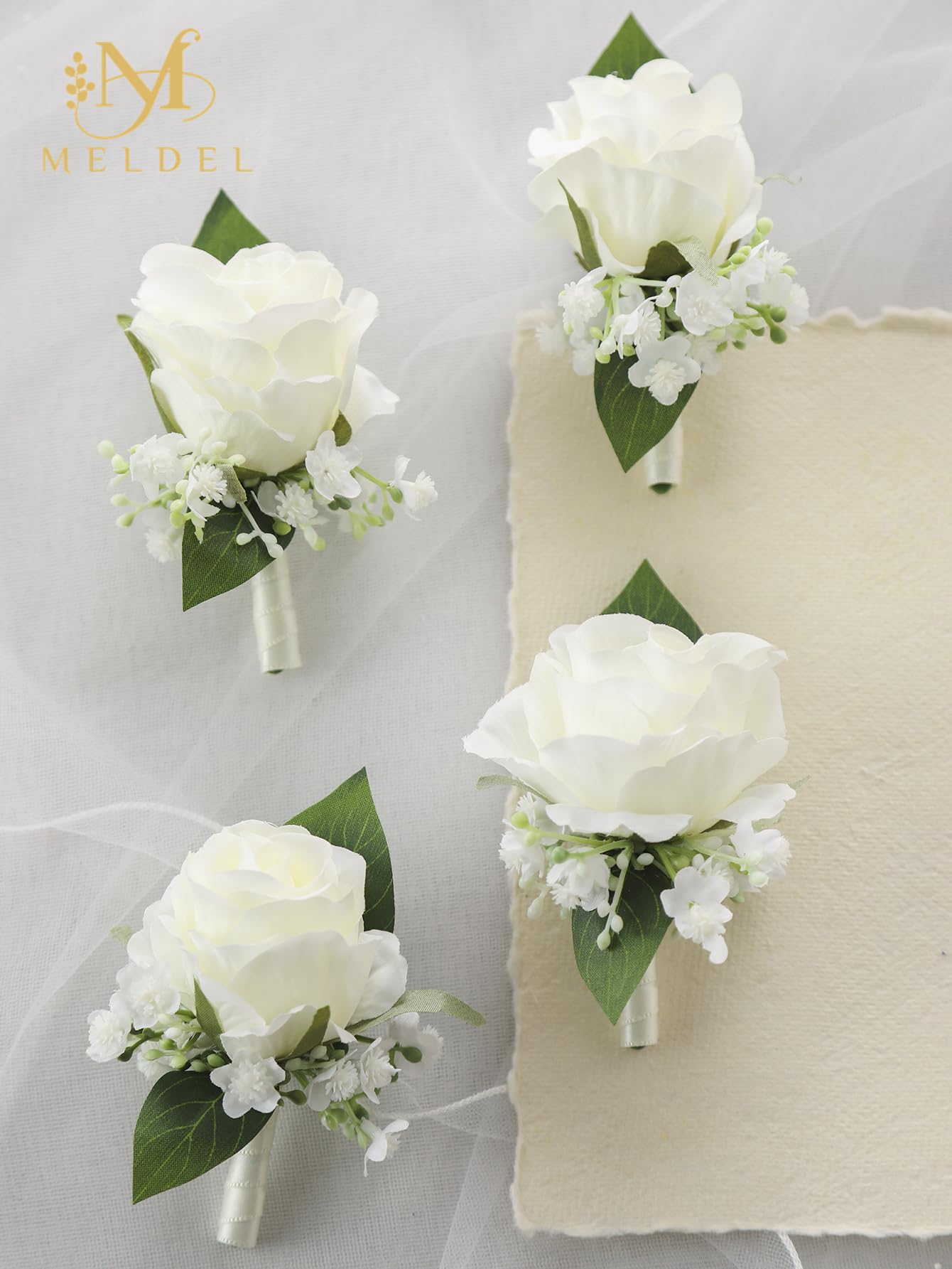 Meldel men's wedding boutonniere with rose and baby's breath, secure back pin.