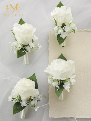 Meldel men's wedding boutonniere with rose and baby's breath, secure back pin.