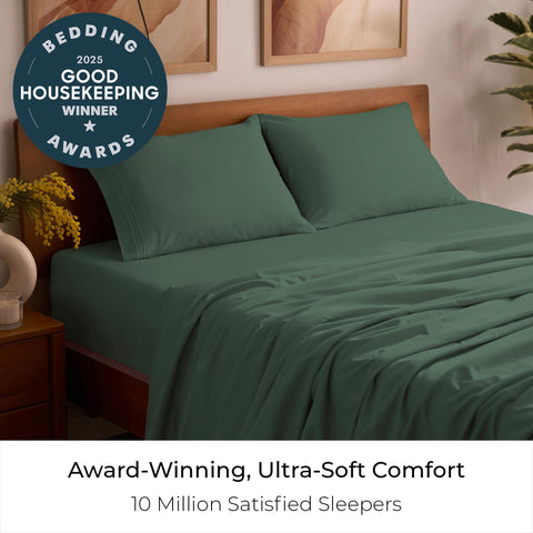 Mellanni queen emerald-green sheets unrolled on a mattress, showing deep pockets for secure fit.