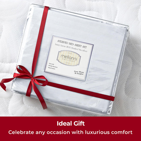Mellanni queen sheets set in-bed view with bold stripes offers hotel-like style.
