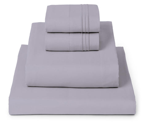 Mellanni queen sheets set on a lavender bed showing luxurious, airy comfort