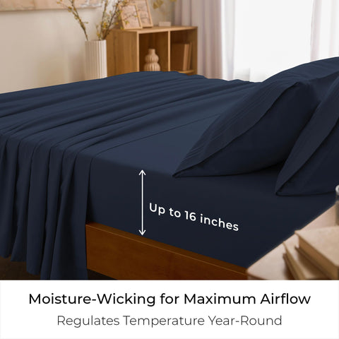 Mellanni queen sheets set navy blue bed close-up shows hotel-luxe fabric and cooling feel.