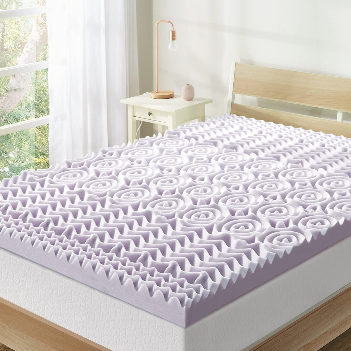 Mellow 3-inch 5-zone memory foam topper supports the body for comfort.