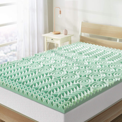 Mellow balance topper on bed shows 5 zone comfort for targeted support.
